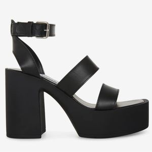 Brand New; 4.25 inch heel height, 1.5 inch platform